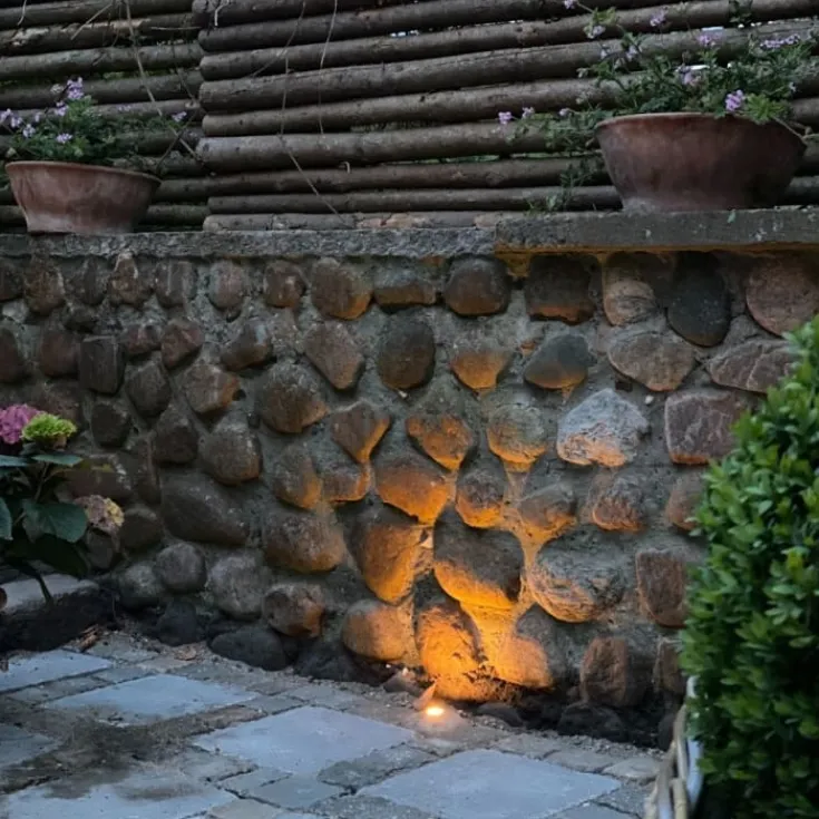Clearance Light By Juhl chaussesten med Cosmos spot, 9x9 cm, Udendørs Spots